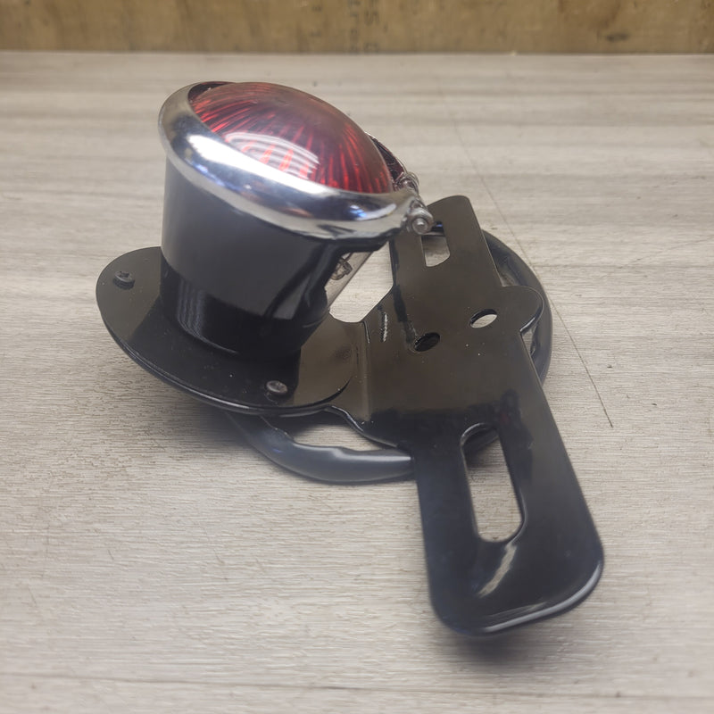 Aftermarket rear brake light/number plate bracket