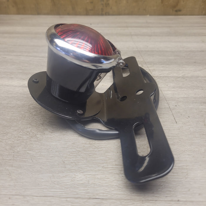 Aftermarket rear brake light/number plate bracket