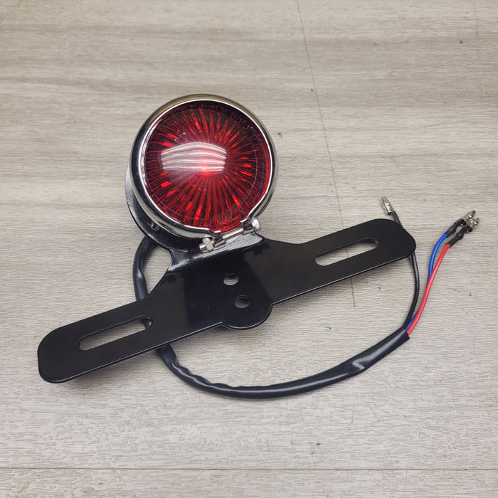 Aftermarket rear brake light/number plate bracket